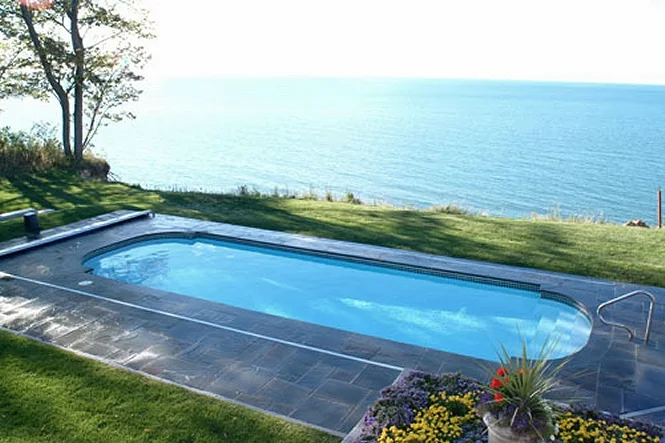 The pool on the lawn above Lake Michigan, edged with bluestone