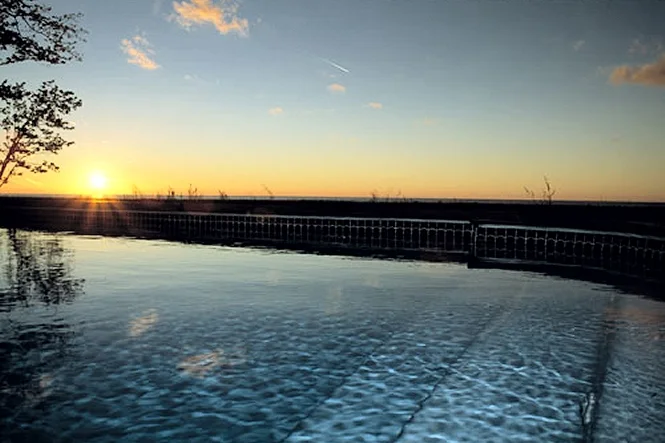 Sunset over Lake Michigan reflected in the pool