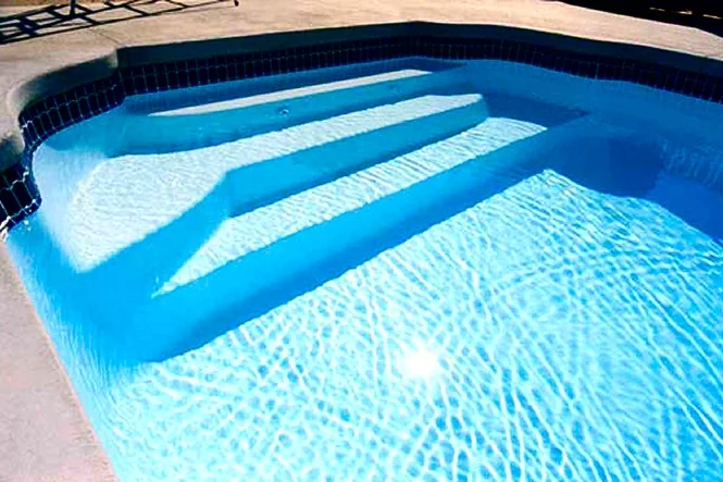 Wide entry stairs with built-in seating at the shallow end