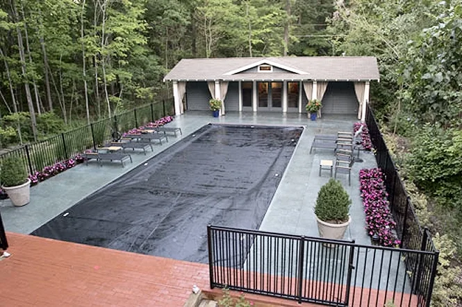 Aerial view with the automatic cover nearly all the way across the pool