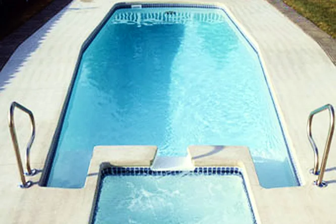 The Newport pool with its spa at the shallow end and steel handrails