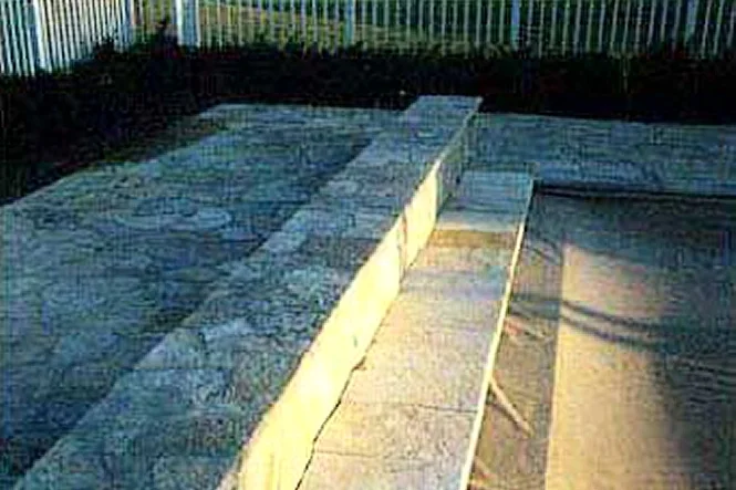 Flagstone steps and the Vanishing Lid at the end of the pool